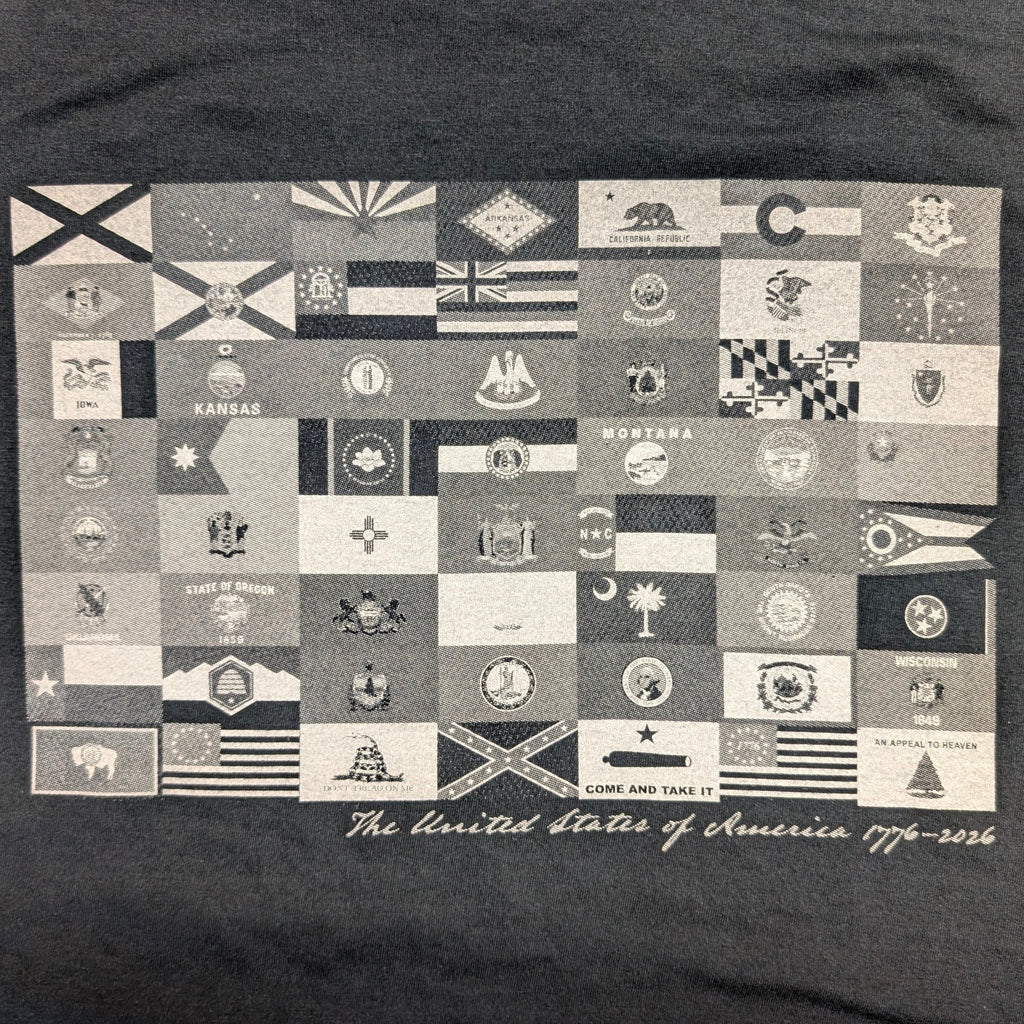 The "250 Years of Liberty" Premium Graphic Tee - Meridian EDC | Laserworks - Black t-shirt with a pattern of small flags and text on a dark background