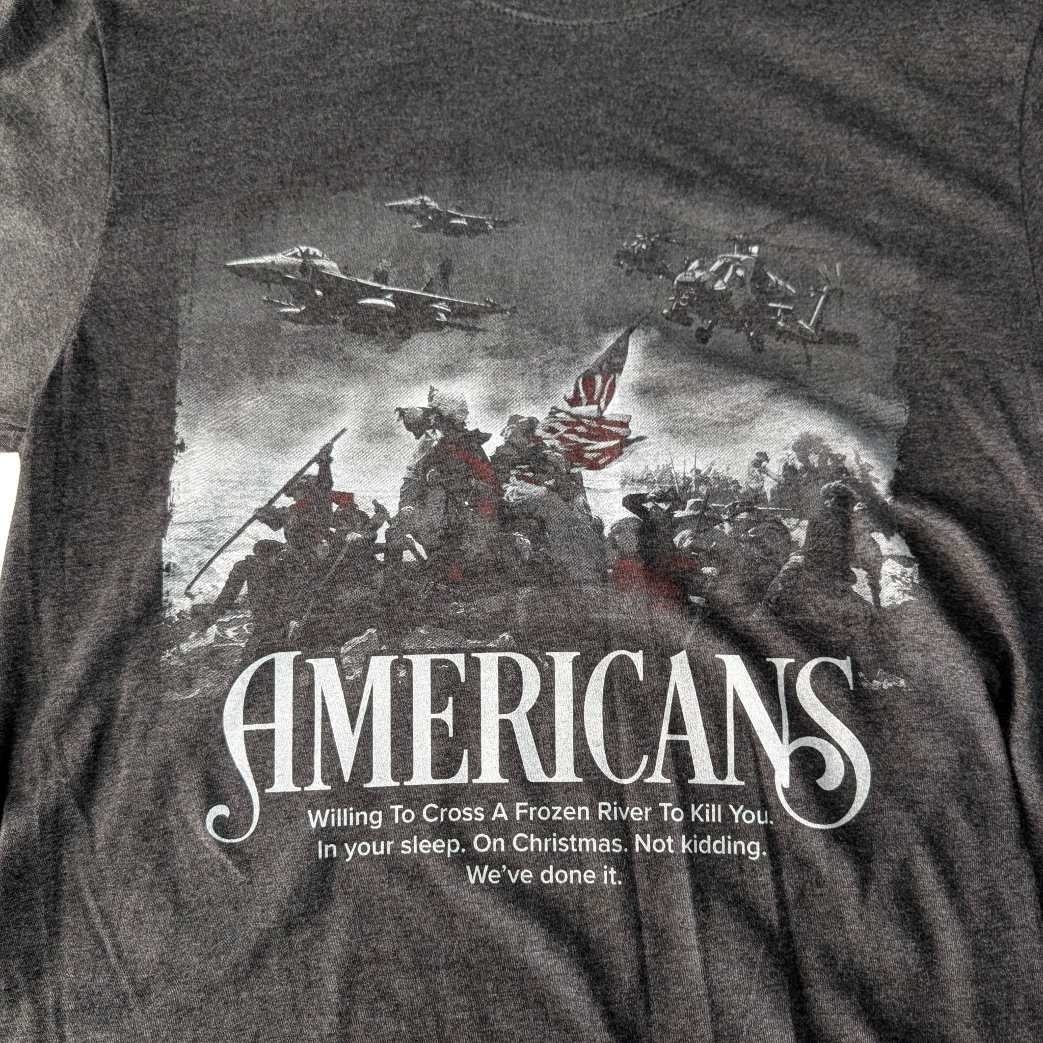 The "American Resolve" Premium Graphic Tee - Meridian EDC | Laserworks - Gray t-shirt with graphic design and text on a plain background