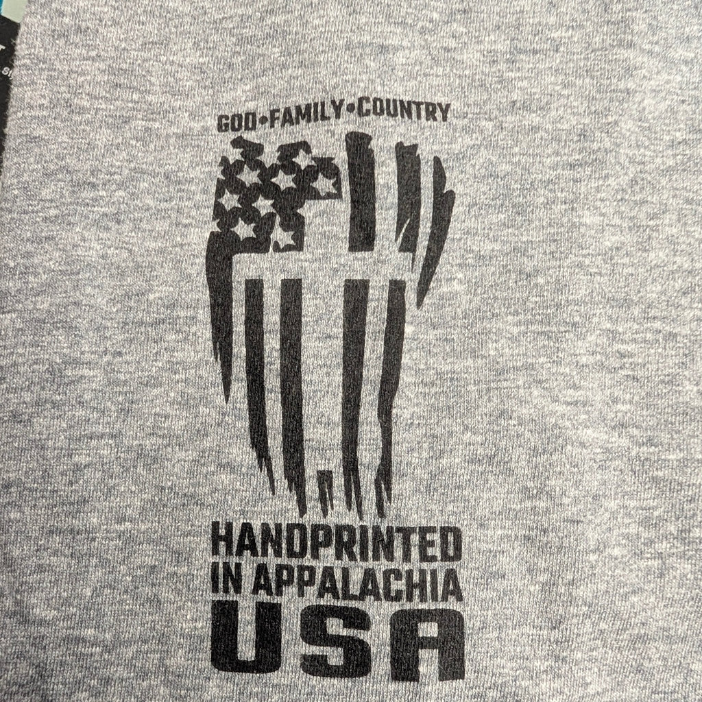 The "Faith & Fortitude" Premium Graphic Tee - Work Hard, Pray Hard - Meridian EDC | Laserworks - Gray fabric with black text and graphics, including 'Handprinted in Appalachia USA'.