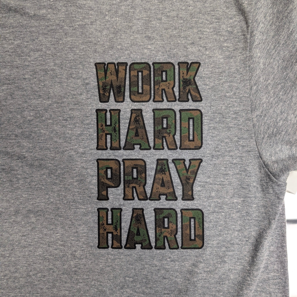 The "Faith & Fortitude" Premium Graphic Tee - Work Hard, Pray Hard - Meridian EDC | Laserworks - Gray sweatshirt with 'Work Hard Pray Hard' text in camouflage print.