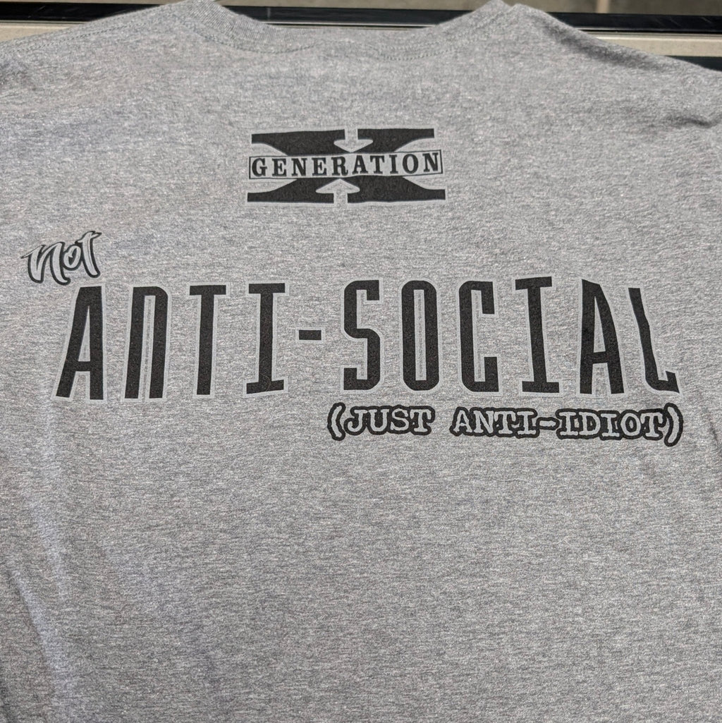 The "Gen X State of Mind" Premium Graphic Tee - Meridian EDC | Laserworks - Gray t-shirt with 'ANTI-SOCIAL' text on a hanger