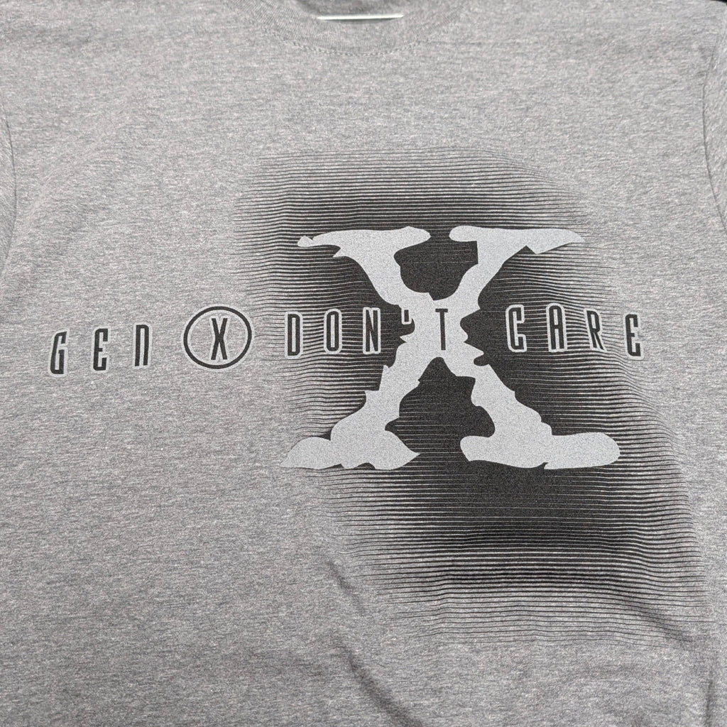 The "Gen X State of Mind" Premium Graphic Tee - Meridian EDC | Laserworks - Gray t-shirt with a graphic design on a hanger