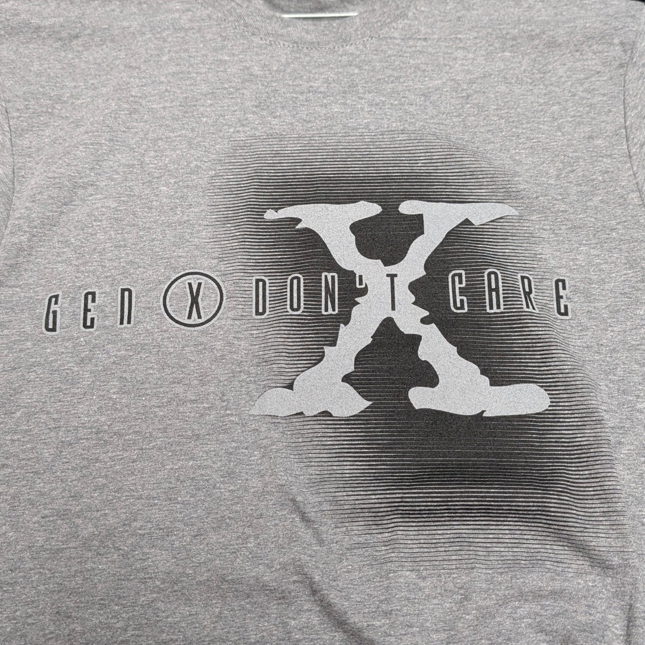 The "Gen X State of Mind" Premium Graphic Tee - Meridian EDC | Laserworks - Gray t-shirt with a graphic design on a hanger