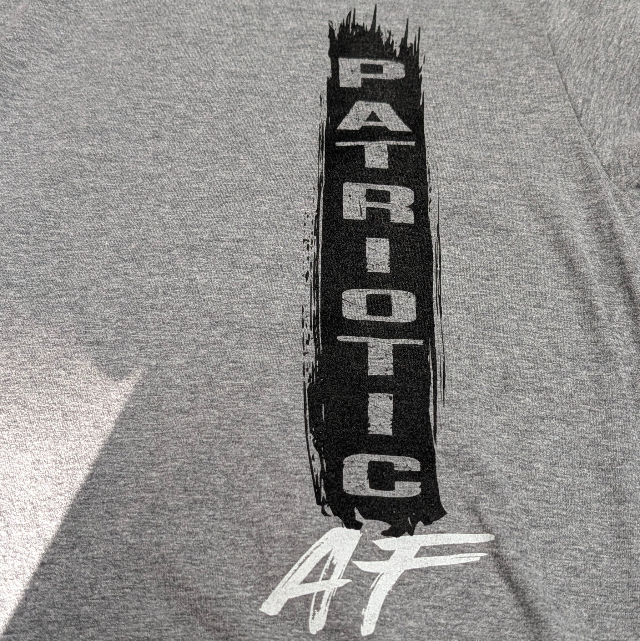 The "Patriotic AF" Premium Graphic Tee - Meridian EDC | Laserworks - Gray t-shirt with 'Patriotic AF' text design on a plain background
